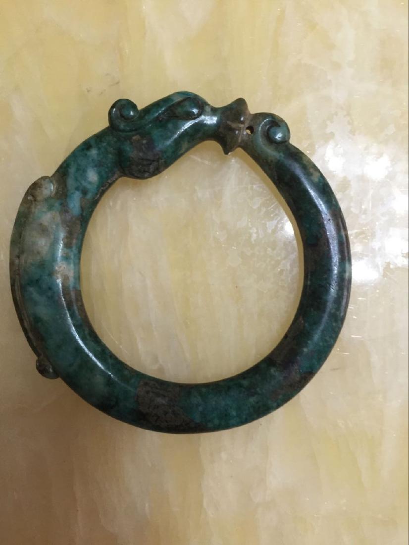 Antique Chinese hand-carved jade bangle (1 of 2)
