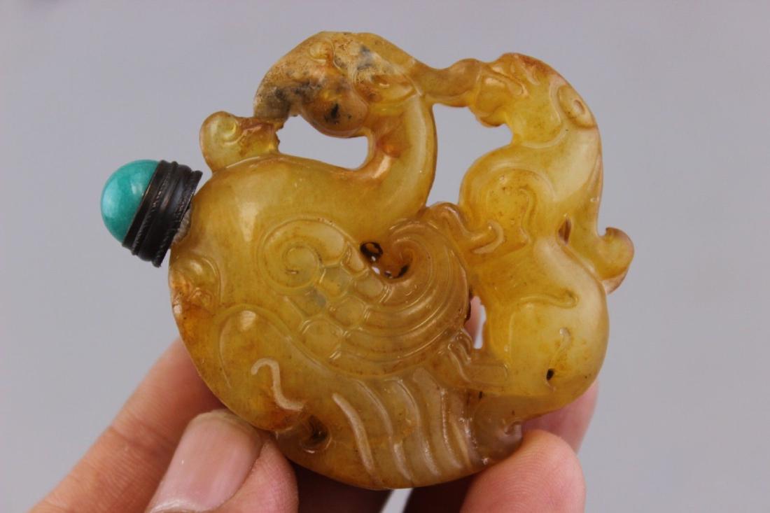 Jade hand-carved ancient beast snuff bottle (1 of 3)