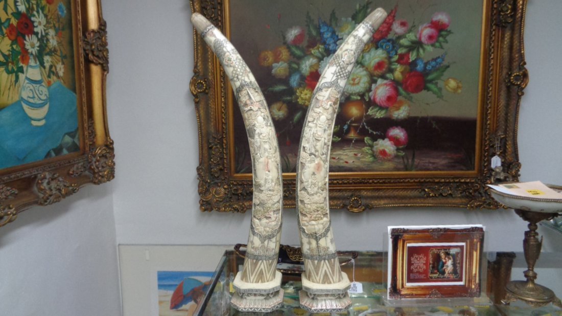 Pair of tall Chinese hand carved ox bone tusks: Pair of tall Chinese hand carved ox bone tusks. Measurements Approx: 30"H x Base: 5"1/2 x 5" 1/2