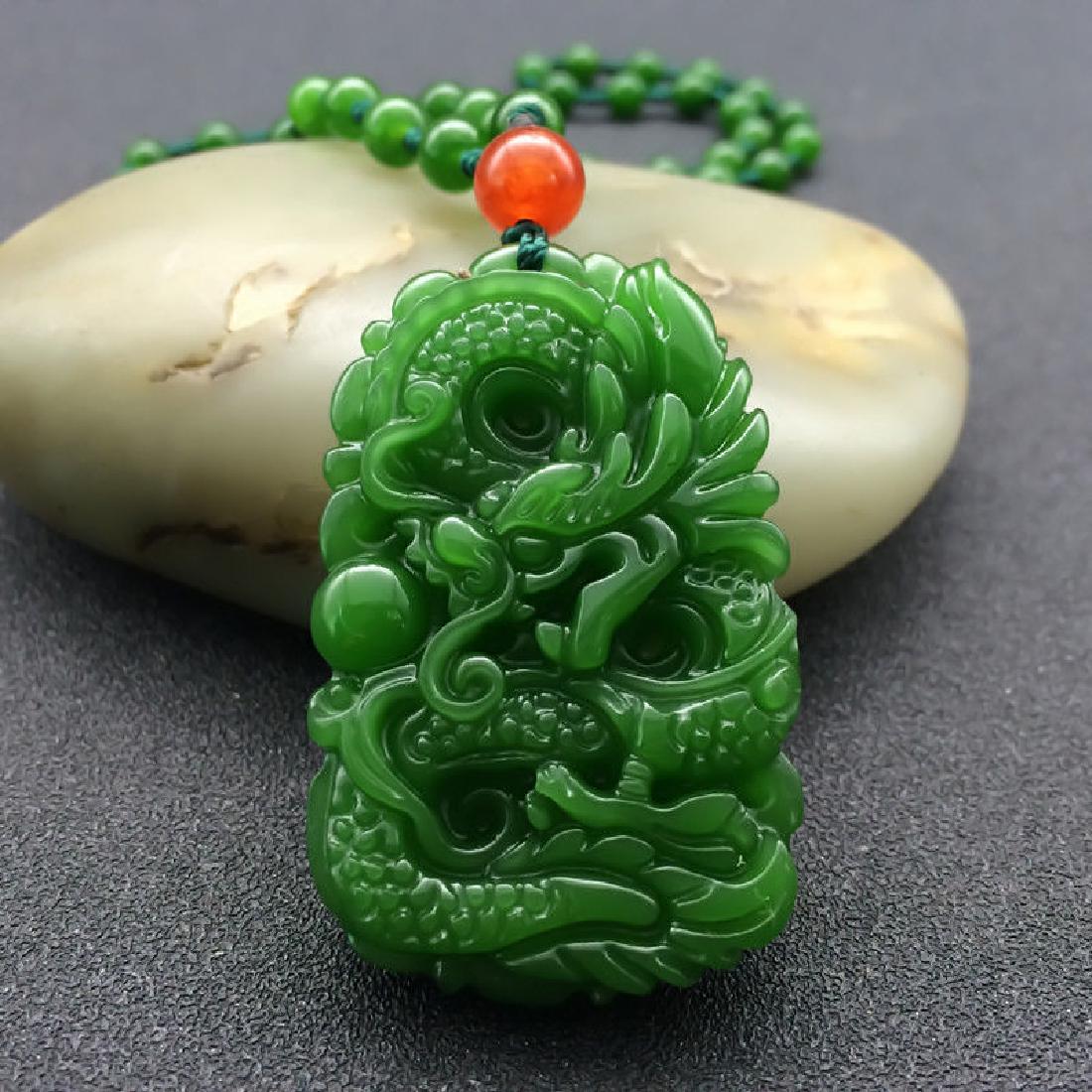 Natural-hand-carved-jade-dragon-pendant-necklace (1 of 1)