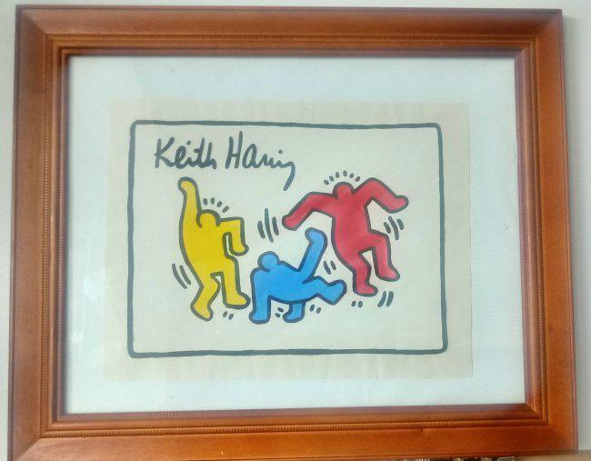 Signed Keith Haring Mixed Media on Paper: Signed Keith Haring Mixed Media on Paper with frame. On verso stamp . Approx Size: 11 3/4 x 8 1/2 inches. Frame size: 17 x 13 1/2. Provenance: New York Collector. All lots that do not carry establishe
