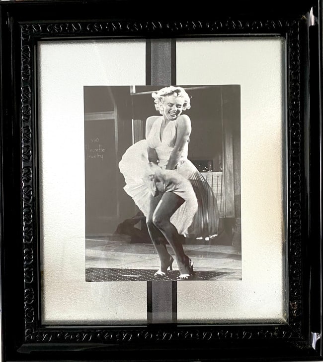 Marylin Monroe Print Blk Frame: Marylin Monroe Print. Framed ready to hang. Frame Size: 16 x 18 Print size: 8 x 10.Marilyn Monroe was an American actress and model. Known for playing comic "blonde bombshell" characters, she became o