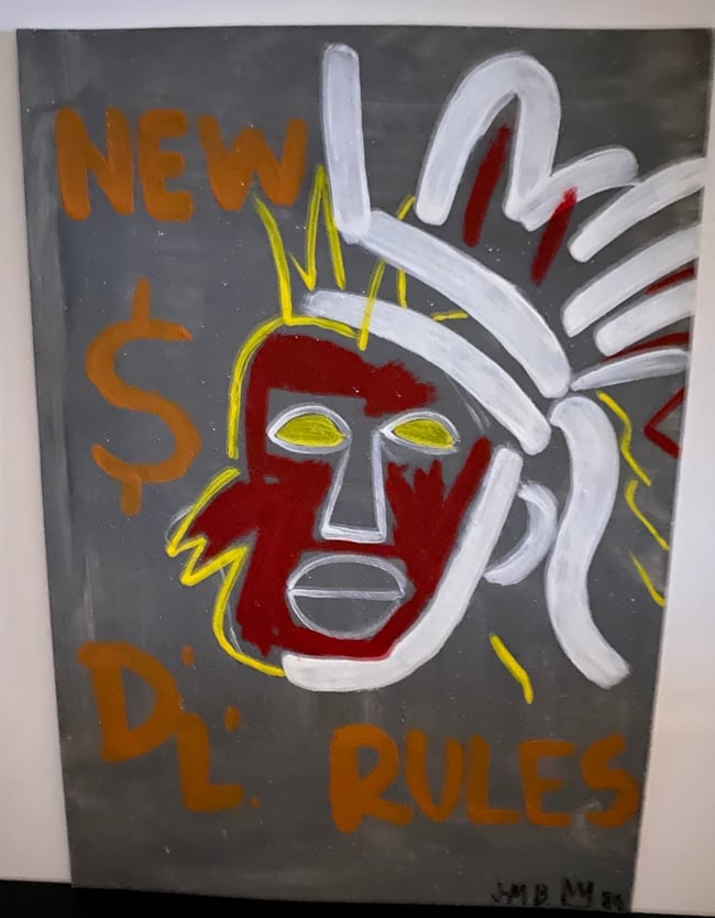 Jean Micheal Basquiat Painting on Cardboard After (artist): Jean Micheal Basquiat Painting on Cardboard.Rendered in the style of After (artist) JMB. Technique: . approx Measures:12 X 9 Inches. Provenance: Private collection New York. The Painting is framed. Li