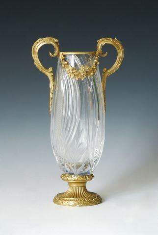 Sculptured Bronze and Crystal Faceted Vase: Sculptured Bronze and Crystal Faceted Vase #2. This Beautiful Glass and Ormolu-Mounted Vase is Mounted in decorative and finely cast Bronze Garniture. This Piece is in Excellent Condition:Dimensions a
