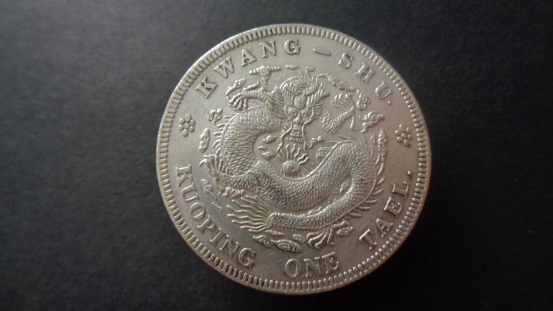 Old chinese silver coins "DQ YB JI 吉" (1 of 2)