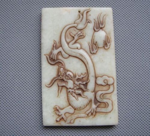 Old China White Jade hand-carved dragon Pendants. (1 of 2)