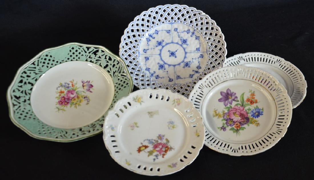 Collection of five carved porcelain plates with (1 of 2)