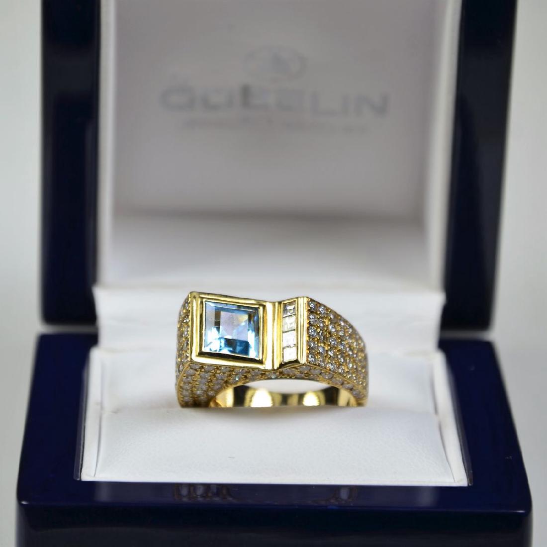 Magnifique bague en or jaune 18 ct pavée de diamants et: Magnifique bague en or jaune 18 ct pavée de diamants et aigue marine, signée de l'orfèvre Technomarine (10 g).