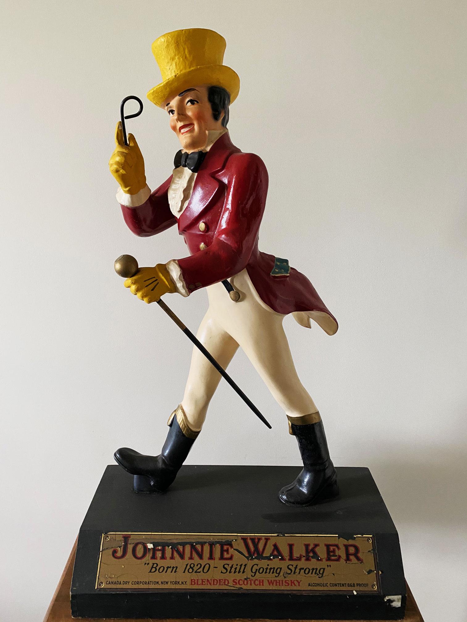 1950's Johnnie Walker advertising Statue: Original Johnnie Walker advertising Statue. Dimensions 70 x 41 x 23cm.
