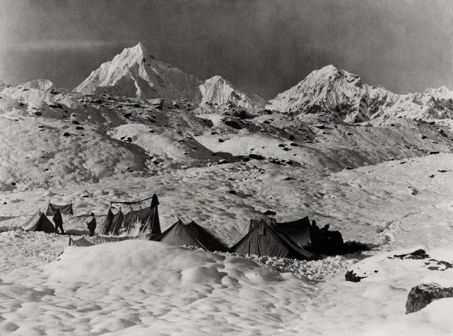 Sella, Vittorio: Camping tents in front of the Ze: Camping tents in front of the Zemu Glacier, Sikkim. 1899. Gelatin silver print. 27,8 x 37,2 cm (29,5 x 39 cm). Photographer's Vittorio Sella Biella blindstamp in lower right corner; Sikhim Himalay