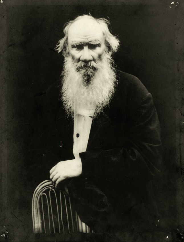 Tolstoy, Leo: Portrait of Leo Tolstoy: Photographer unknown. Portrait of Leo Tolstoy. Circa 1900. Vintage gelatin silver print on strong chamois paper. 27 x 21 cm. Pinholes in corners, oxidation mirroring around edges, small tear in right