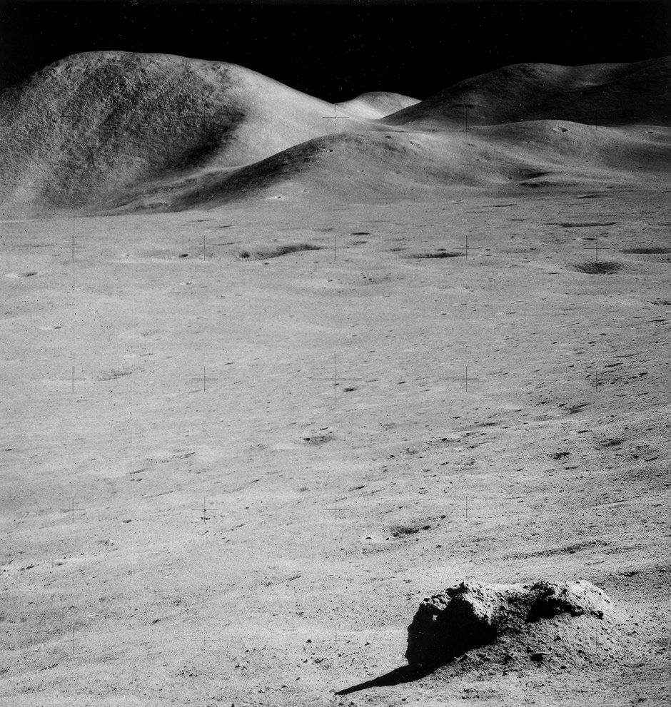 NASA: Mount Hadley, Apollo 15: Photographer: James Irwin. Mount Hadley, Apollo 15. August 1971. Vintage gelatin silver print. 18,5 x 17,5 cm (20,5 x 25,4 cm). NASA number AS15-90-12187 in the negative in margin upper left; typed pr