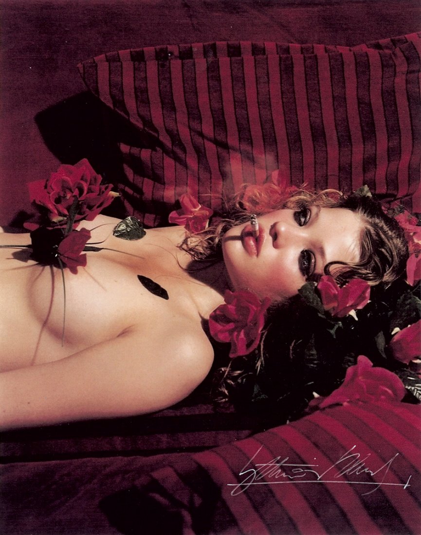 Rheims, Bettina: Model smoking: Model smoking. Circa 2000. Chromogenic print on Kodak paper. 25,2 x 20,3 cm. Signed by the photographer in white ink in lower right; copyright label on the verso. In excellent condition.