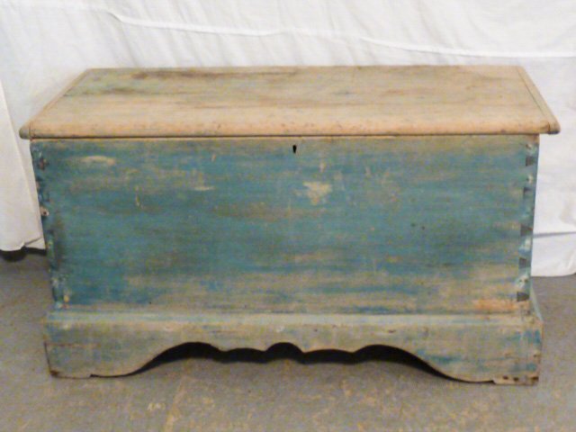 19TH C. SIX BOARD CHEST ON CUTOUT BASE OLD BLUE: SHOWING A 19TH CENTURY SIX BOARD CHEST ON CUTOUT BASE AND DOVETAIL CONSTRUCTION , IN OLD BLUE . MEASURES 42" WIDE BY 23" HIGH AND 19" DEEP . AS FOUND ESTATE CONDITION.PLEASE USE PHOTOS AS PART OF THE 