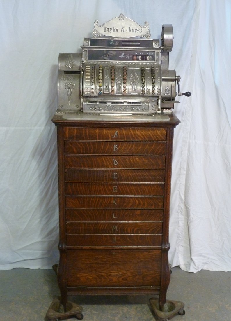 National Cash Register No. 584107 w/9 Drawer Oak Base