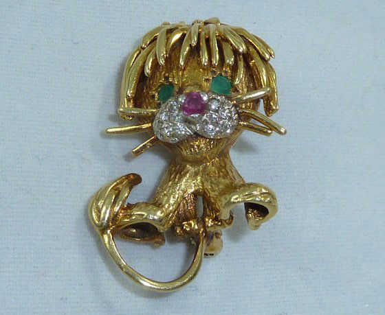 14kt Gold Playful Lion Pin Diamonds Ruby & Emeralds: 5.7 dwt. , 1 1/4" tall. As found estate condition . Please use photos as part of the description. The absence of a condition report does not guarantee excellent condition. Please contact us for an in