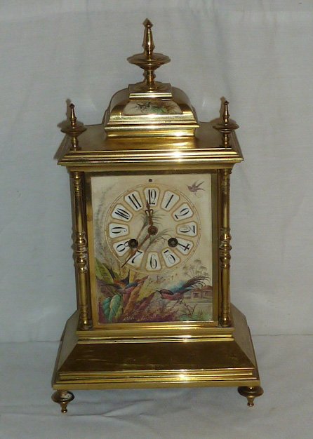 19th C. Bronze & Porcelain Mantel Clock L.Martin: Movement signed Medalle De Bronze L.Martin Et Co. Painted birds adorn the front porcelain panel. , has pendulum and key . Measures 14 1/2" tall x 8" wide and 5" deep.Not running , easy fix. As found e