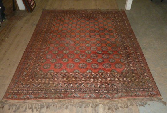 Semi-Antique Hand-Knotted Bokhara Rug: Original fringe border. Measures 120" x 97" . As found estate condition . Please use photos as part of the description. The absence of a condition report does not guarantee excellent condition. Please