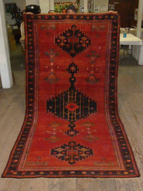 Persian Scatter Rug Hand Knotted Red Field: Five Borders , Measures 124" x 65" . As found estate condition . Please use photos as part of the description. The absence of a condition report does not guarantee excellent condition. Please contact 