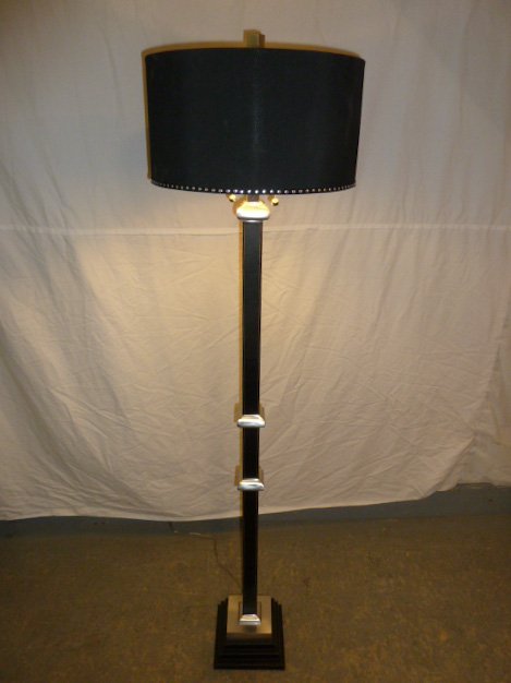 Frederick Cooper Designer Leather & Chrome Floor Lamp: Leather covered Base with chrome accents. 4 tiered base. Measures 63" tall with a 16" shade. As found estate condition . Please use photos as part of the description. The absence of a condition report
