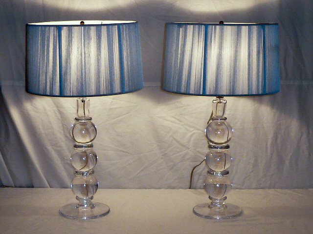 Simon Pearce Pair Hand Blown Lamps: Hartland Design , Characterized by it's stacked spherical design .Measure 26" tall . As found estate condition . Please use photos as part of the description. The absence of a condition report does no