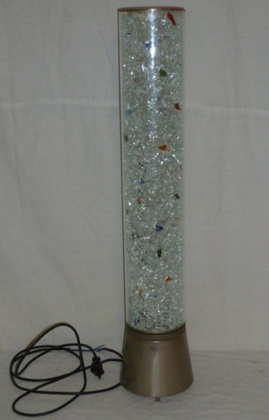 Woka 1989 Multi-colored Glass Cylinder Lamp: Measures 29 1/2" tall on a 6" round base. As found estate condition . Please use photos as part of the description. The absence of a condition report does not guarantee excellent condition. Please con