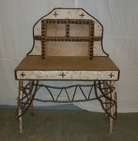 Birch Bark Adirondack Writing Desk: Open top , twig design. Measures 54" tall by 40" wide and 20" deep. As found estate condition . Please use photos as part of the description. The absence of a condition report does not guarantee excel