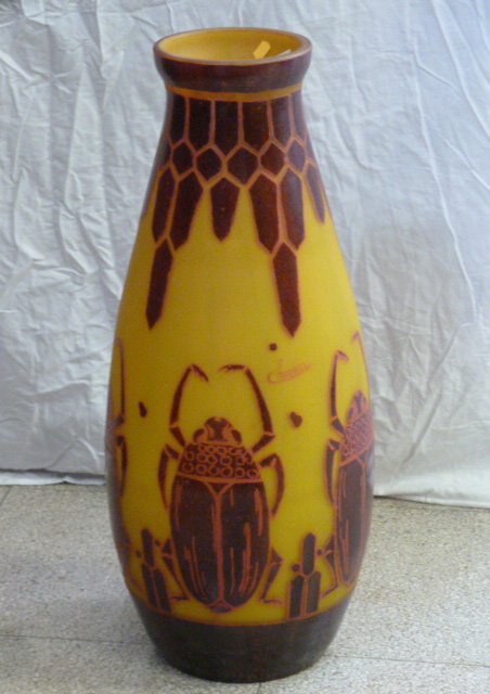 Oversized Cameo Glass Vase Scarab s/Charder: Scarab motif, marked Charder. Measures 26 1/2" tall . As found estate condition . Please use photos as part of the description. The absence of a condition report does not guarantee excellent condition