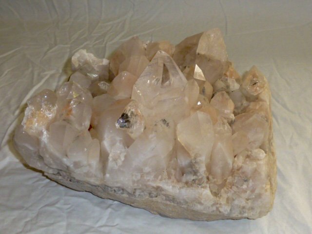 Clear Quartz Crystal Cluster Geode: This natural quartz geode measures 13" across and 8" high and deep. As found estate condition . Please use photos as part of the description. The absence of a condition report does not guarantee excel