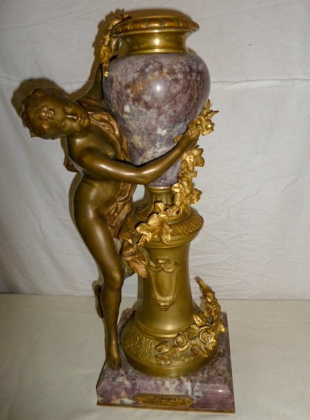 Mathurin Moreau French Bronze Sculpture Les Roses: Plaque signed Les Roses , statue signed Math Moreau . Measures 20" tall on a 7" by 7" base. As found estate condition . Please use photos as part of the description. The absence of a condition report 
