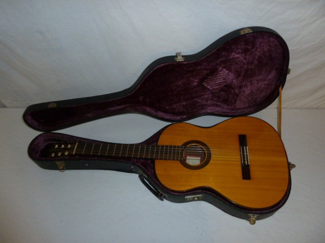 Moises Barbera Barcelona Acoustic Guitar: Luthier hand made six string guitar . Barcelona Espana , Model C-5 , number 329 , Inlay work . Measures 39 1/2" long and 14 7/8" widest point. Hard case included. As found estate condition . Please us