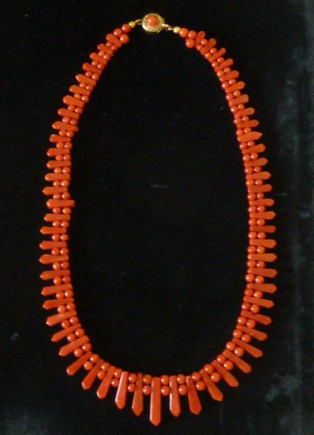 Victorian Faceted Mediterranean Coral Necklace: Natural , untreated coral necklace with angular faceted graduated beads alternated with round beads. Measures 16 1/2" long. As found estate condition . Clasp is 800 silver, stamped/marked, I also test