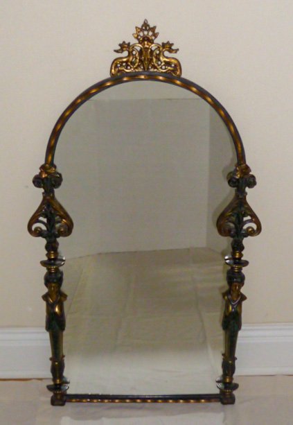 Oscar Bach Attributed Bronze & Iron Figural Wall Mirror: Neoclassical motif wall mirror, mixed metals with partial nude female busts decorated with open work gilt friezes. Measures 38" high by 19" wide. As found estate condition . Please use photos as part 