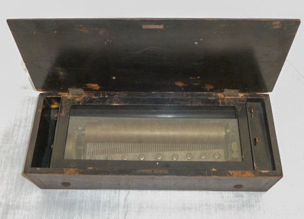 Antique Cylinder Swiss Music Box: There is a number on the cylinder wheel, 1091 with other marks (see photo). Measures 22 1/2Â” long by 8 1/2Â” deep and 5 3/8Â” tall. Playing well. The Cylinder measures 13" long and there are