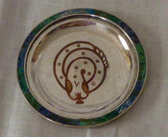 Los Castillo Solid Silver Hand Wrought Snake Tray: Beautiful example of the finest work by Los Castillo. Tray is solid hand wrought silver. Center image is copper snake with turquoise surround. Circumference is 5Â” . Marked on back : Los Castillo, 