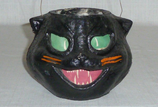 Vintage Black Cat Lantern Candy Container: Antique Halloween Paper Mache. Scary Full Head Black Cat Lantern Candy Container. Cat Measures 5Â” by 7Â” and has a Wire Handle. Condition is Very Good Vintage . Please use photos as part of the
