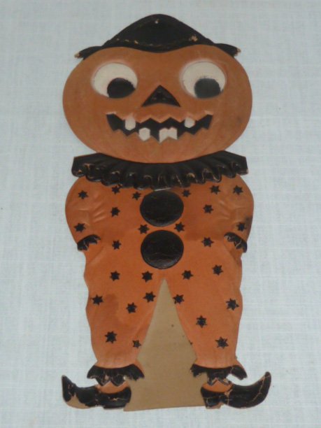 USSR Occupied Germany Halloween Die Cut Jack O Lantern: Vintage Halloween Die Cut Full Figure of Half Human Jack o Lantern Dressed in Clown Halloween Costume . Dates to WWII USSR Occupied Germany, Stamped on back. Easel on back. Condition good Vintage. As