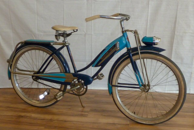 1953 Western Flyer X-53 Super Bicycle Deluxe: Western Flyer was top of the line bicycle sold through Western Auto store. This bike was built by Murray Mfg. Co. Most likely , many of the components on the bike were styled by Murray-OhioÂ”s chie