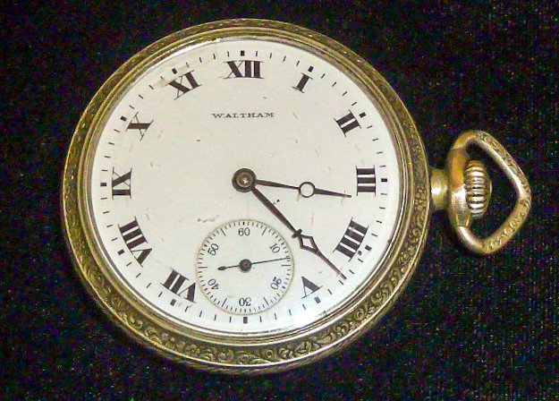 Waltham RR Pocket Watch Steam Engine Etched Back: Back of case has a Etched Train / Steam Engine, Porcelain dial, Roman numerals, 15 jewels, Keystone Silveroid screw back case, measures 2” diameter. As found estate condition . Please use photos as 