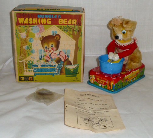 Bubbles Washing Bear Battery Op Toy MIB Yonezawa: Washing bear battery toy is in mint condition , appears to never have been used. Comes with the original sort after box . Has the original instructions and plastic bubble solution. Rosko Steeld Inc. M