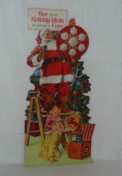 Coca-Cola Santa Store Counter Display "Holiday Ideas": Coke 1950's - 60's advertising sign. Never released to the public , this easel counter top store display was there for all to see and enjoy. What would Christmas be without the joy of giving and in th