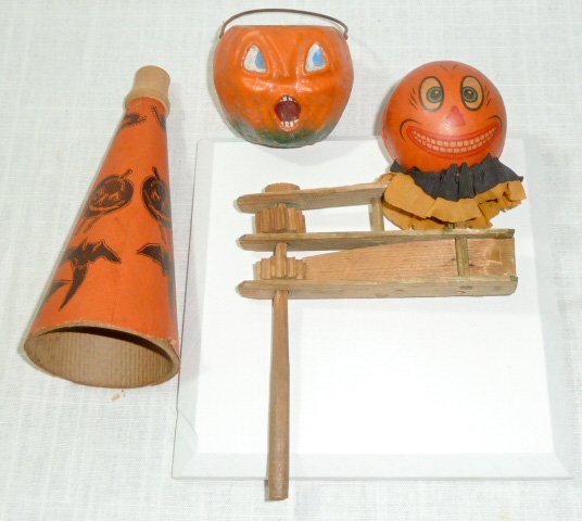Antique Halloween Pumpkins, Witches, and Bats lot of 3: Lot Of Three Vintage Halloween items , Fabulous Jack-O-Lantern Noise Maker. Pumpkin sits atop a wood crank which when turned makes noise. Piece measures 5 1/2” by 7 1/2” including Handle. Jack has