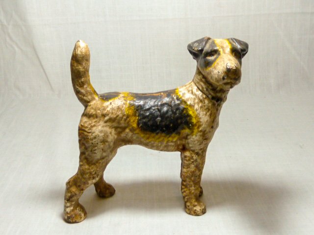 Cast Iron Large Terrier Dog Antique Door Stop: Cast Iron Enamel Painted Terrier Dog Door Stop .Possibly Hubley? This is a Larger size, measuring 8 1/2Â” Tall by 7Â” Paw to Paw. Paint Good for age. As found estate condition . Please use photo