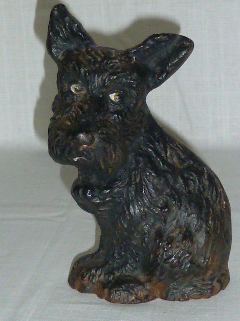 Vintage Wilton Foundry Cast Iron Scotty Dog Door Stop: Antique Iron Scotty / Scottie Dog Door Stop. Door stop is made by the Wilton Products Foundry in Wrightville PA. U.S.A. . Scottie Measures 8” tall by 4 3/4” at bottom. Very heavy. Good Vintage Con