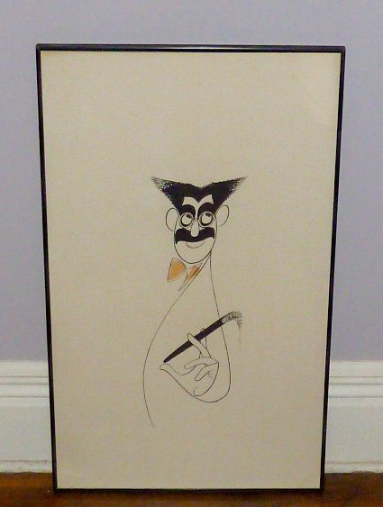 Groucho Marx - Al Hirschfeld Print "Life in Review": 17 1/2" by 29 1/2" framed. Who doesn't love Groucho , You bet your life , we do... As found estate condition . Please use photos as part of the description. The absence of a condition report does not