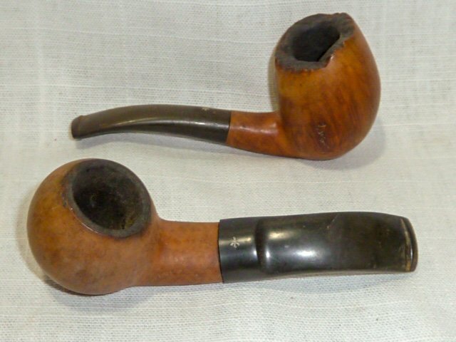 2 Briar Workshop Designers / Pipemakers Smoking Pipes: 1. Smooth top smoking pipe measures 4 1/4" long 2. Free form top smoking pipe measures 4" long. As found estate condition . Please use photos as part of the description. The absence of a condition rep