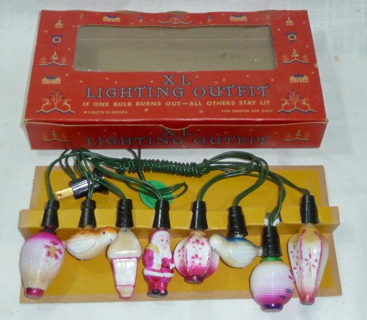 Reliance No. 2 Xmas Tree Outfit 8 Milk Glass Bulbs MIB: 1940's - 50's Reliance no. 2 XL Lighting Outfit , comes with eight bulbs : 5 Lanterns , 2 Birds , and a full figure Santa Claus . Never taken out of the box, unused condition. Colorful display box mea