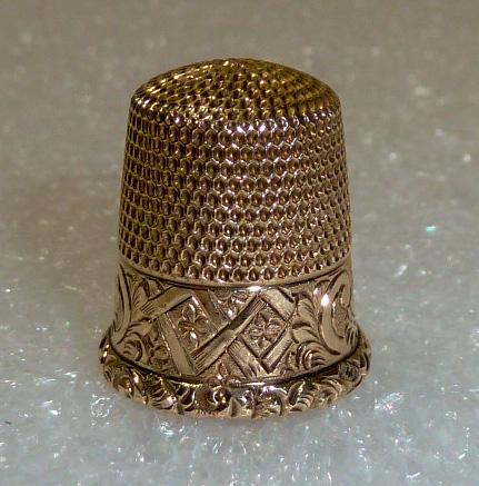 14kt. Gold Antique Sewing Thimble: 14kt. Gold Antique Sewing Thimble. Thimble weighs 1.9 dwt and is beautifully embossed around. As found estate condition . Please use photos as part of the description. The absence of a condition repor
