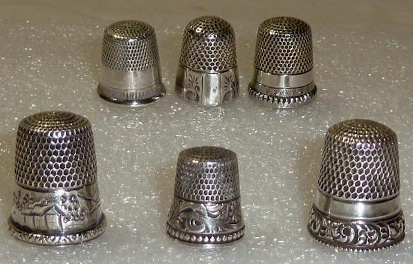 Antique Sterling Silver Thimbles set of Six 1800's: Sterling Silver Sewing Thimbles Set Of Six Ornate Silver Thimbles from about 1800's. As found estate condition . Please use photos as part of the description. The absence of a condition report does no