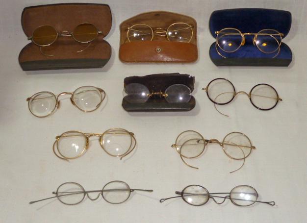Vintage Men's Eye Glasses gold filled 10 in lot: Antique Eye Glasses. There are 10 pairs of early Vintage men's Eye Glasses. Most are gold filled. Two are very early silver tone and one so early it has a nose clip. Two have just one arm. 4 have case